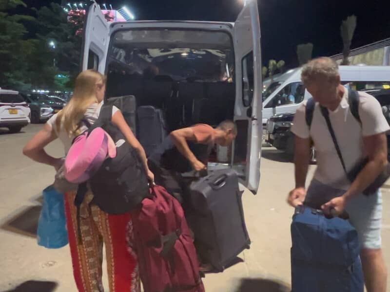 Helpful driver from Truey Hoian helps loading suitcase into the van